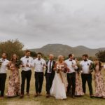 Bridal party in field